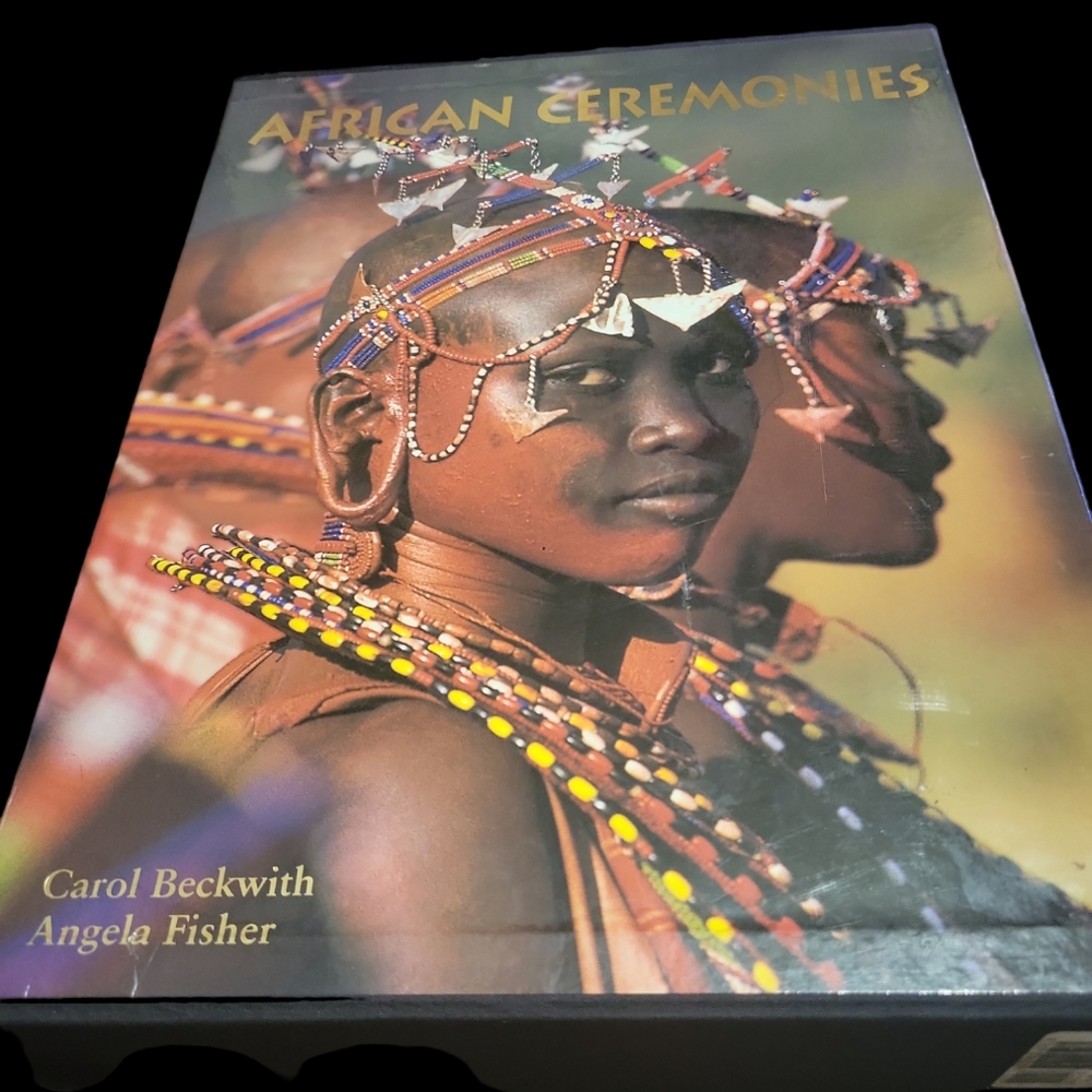 Set of 2 African Cermoines oversized photography books.